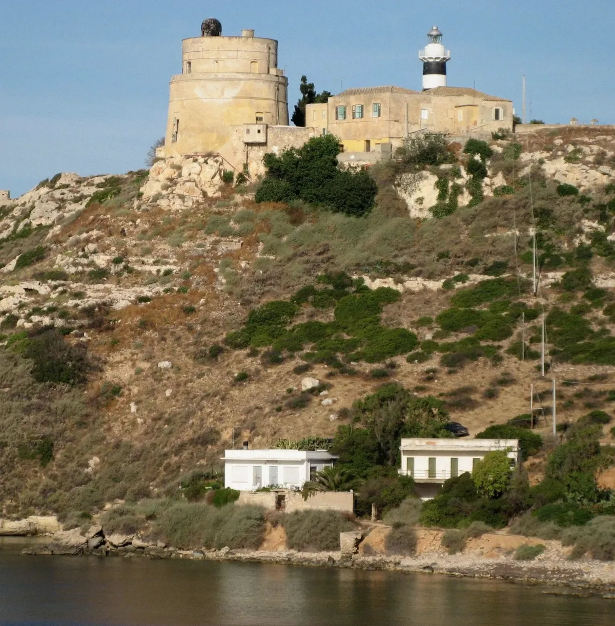Lighthouse near Calamosca on the Cagliari coast seen on the zodiac boat tour route